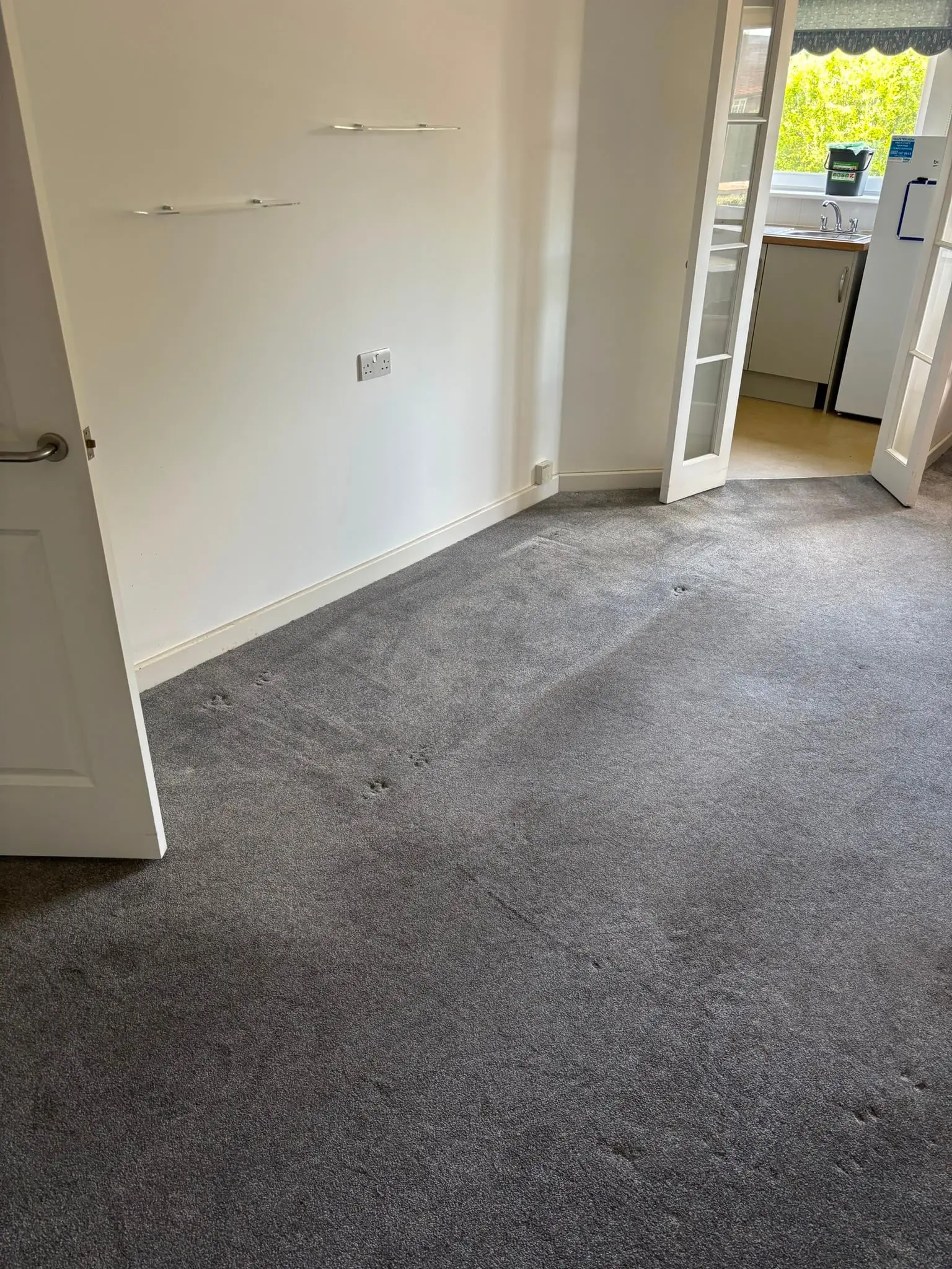 Empty, cleared room in a rental property after an end-of-tenancy clearance.